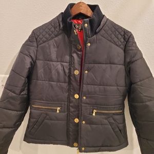 Black Coat long sleeve gold button up front two zippers on the side.